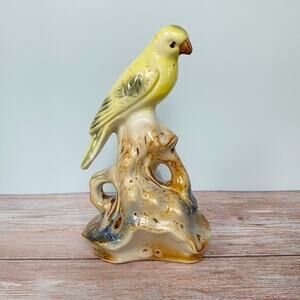 Vintage yellow parakeet on driftwood Figurine